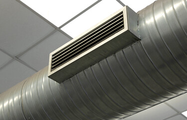 big pipe of the air conditioning system in the factory and the nozzle for the release of hot or...
