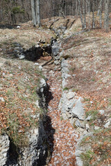 war trench dug into the rock by soldiers to defend against enemy attacks