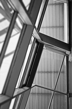 view of metal and glass structure, constructivist architecture, black and white photography 