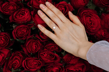 she said yes. close-up of woman hand with engagement rings. Hand of the on the background of the...