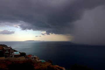 Naklejka na ściany i meble crete bad weather is coming over the ocean