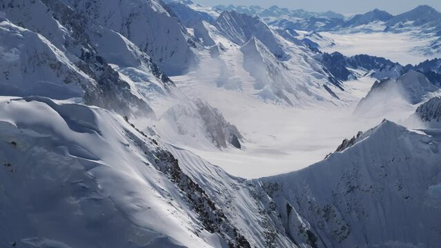 Aftermath of an avalanche in the steep alpine mountains of Saint Elias Ice Field