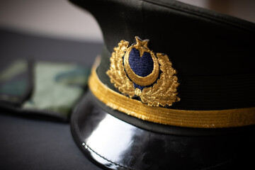 A military hat with moon and star