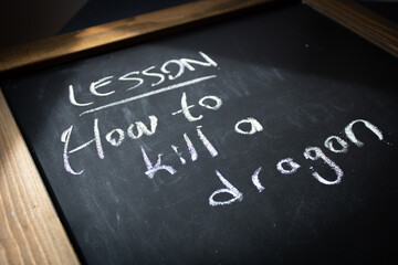 Fototapeta premium How to kill a dragon on chalkboard
