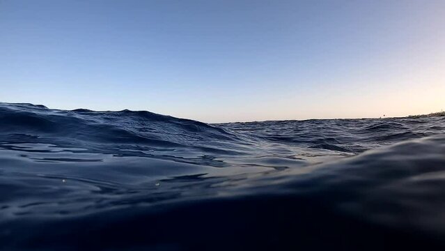 Underwater camera plunges over down into the water and into the depths of Egypt, the Red Sea. hd video
