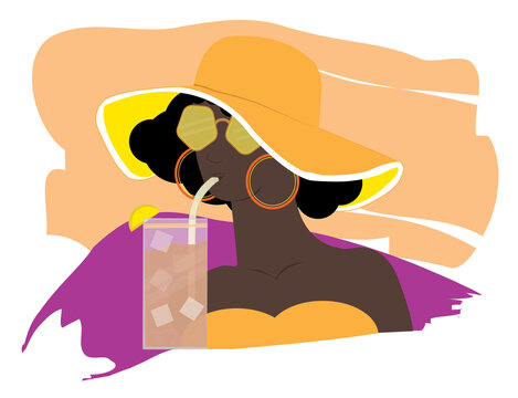 Woman in sunglasses enjoying a drink in the summer sun