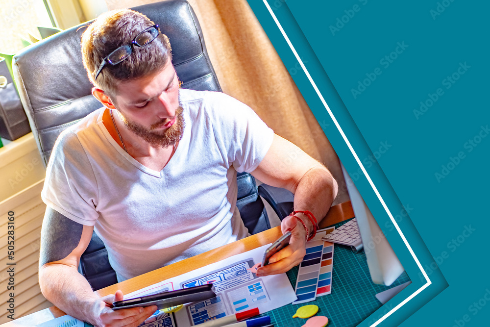 Poster man is working on application interface. it draws application interface on paper. web designer at wo