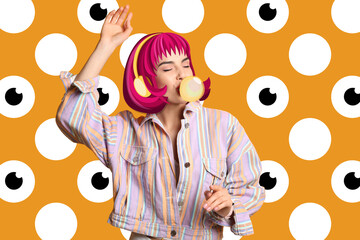 Young woman in drawn colorful wig with headphones dancing on orange spotted background. Bright...