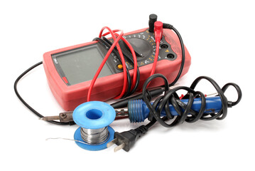 Electric soldering iron with the blue handle and Roll of soldering wire on a white background