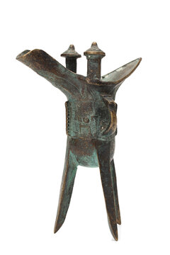 ancient bronze drinking vessel of jue isolated on white background