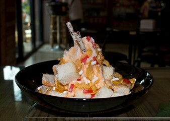 Sweet ice dessert,Thai tea with Bread, Thai called : Pang Yen - obrazy, fototapety, plakaty