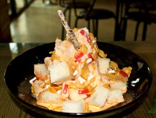 Sweet ice dessert,Thai tea with Bread, Thai called : Pang Yen - obrazy, fototapety, plakaty