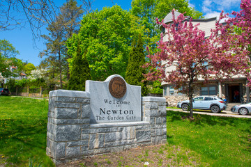 Welcome to Newton sign in spring on Commonwealth Avenue in Chestnut Hill, city of Newton,...
