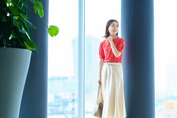 A woman commuting to work in the office district