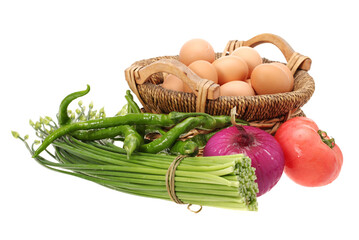 eggs and vegetable on a white background