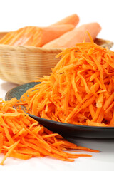 The polished carrots on a white background