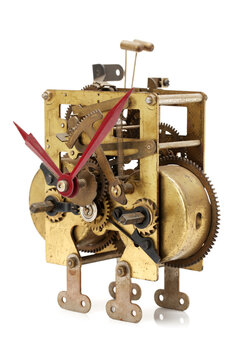 image of clock mechanism inside over white background
