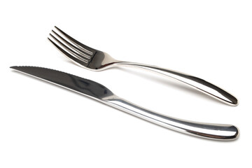Stainless knife and fork on white background 
