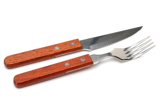 Stainless Knife And Fork On White Background 