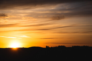 Fototapeta na wymiar Hills, sky in spring at sunset like in Portugal.