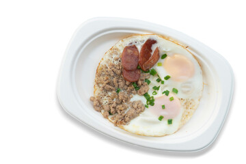 Indochina pan-fried egg with toppings in my homemade. Arrange on a white paper plate. On isolated white background with clipping path.