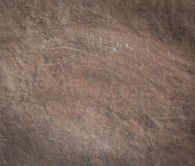 Brown rough cement wall for background.