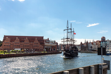  A replica of a galleon as a cruise ship on Motława River in old town of Gdansk