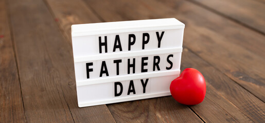 Happy Fathers Day, Father's lightbox message with red heart. Greeting card concept. I love dad