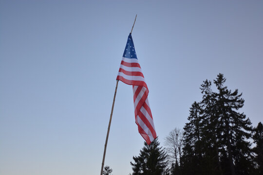 American flag waving in the wind in Switzerland, La Vue des Alpes