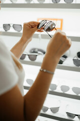 sunglasses, choose glasses, shopping for goods, buying glasses, glasses shop, optometrist