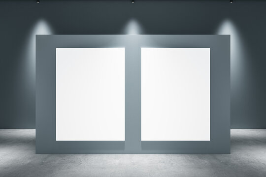 Modern concrete gallery interior with lights and white mock up poster on wall. Exhibition concept. 3D Rendering.