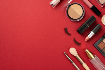 Make up concept. Top view photo of lipstick lip gloss contouring and eyeshadow palettes false...