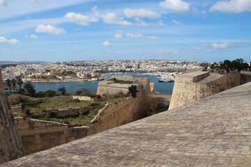 cities of valletta (foreground) and slima (background) in malta