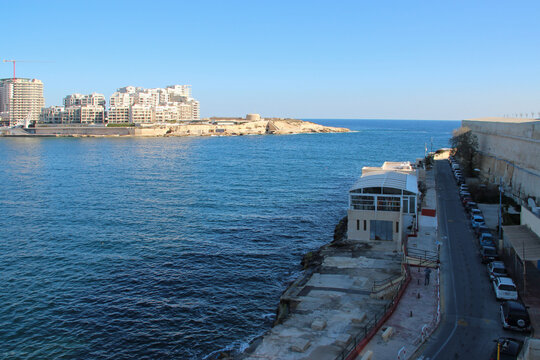 cities of valletta (foreground) and slima (background) in malta