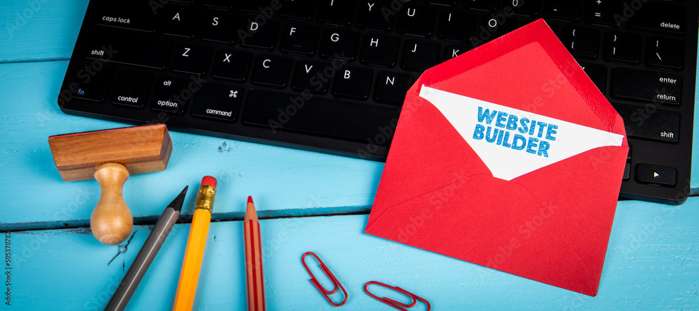 Sticker website builder. letter on black computer keyboard