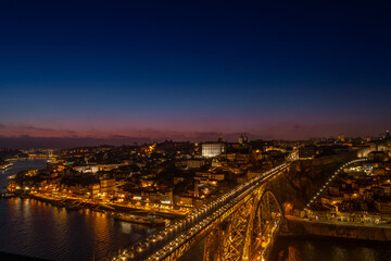 Fototapeta na wymiar Sunset on Ponte Luis I, Porto (Portugal) May 2022 