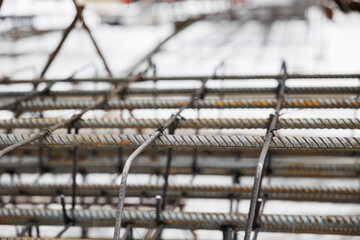 welded steel reinforcement for prestressed reinforced concrete. Construction and architectural works. Steel reinforcement steel framing for beams. Blurred background and selected focus