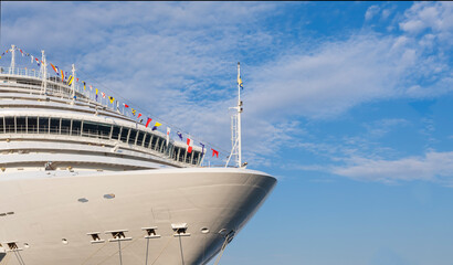 cruise ship on cloudy sky background
