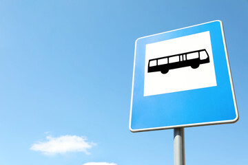Traffic sign Bus Stop against blue sky, space for text