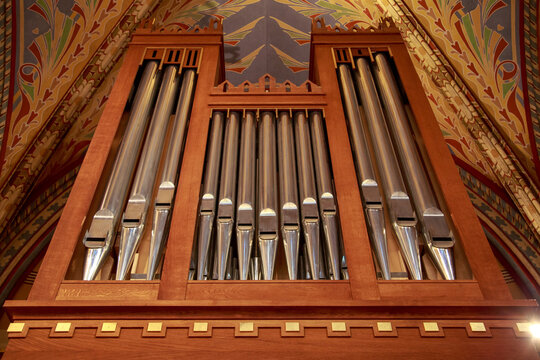 Close-up of modern steel organ pipe