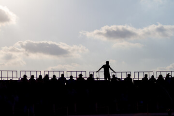 silhouette of bullfight spectators