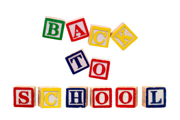 alphabet in wooden blocks, back to school isolated on a white background.