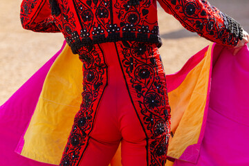 typical bullfighter costume in a bullfight