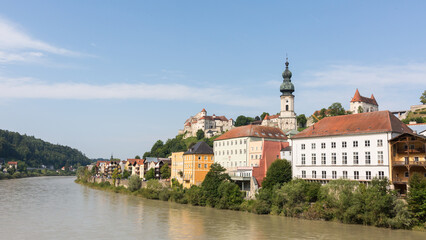 Naklejka na ściany i meble View on the town of Burghausen. With river Salzach, church St. Jakob and the main castle.