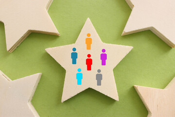 forming a successful team, people icons over wooden star, human resources, and management concept