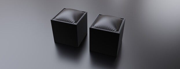 Black cube chair on black background. Overhead view, banner. 3d rendering