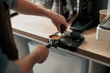 Process of preparing coffee tablet before instaling it into the coffee machine