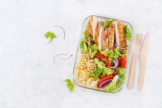 Lunchbox. Lunch Box With Grilled Chicken Fillet And Pasta Salad With Fresh Vegetables. Top View, Overhead