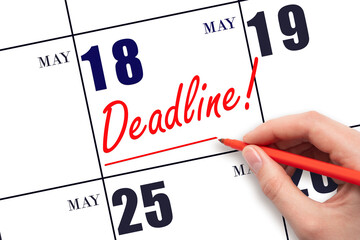 Hand drawing red line and writing the text Deadline on calendar date May 18. Deadline word written...