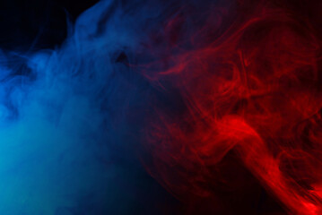 Fototapeta premium Blue steam on a black background.